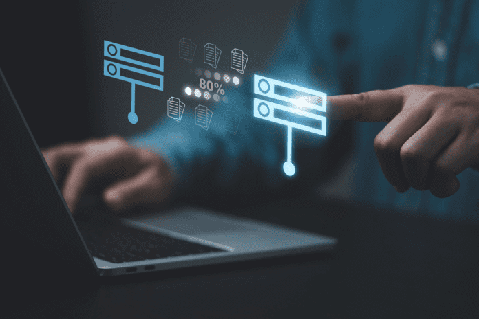 Businessman hand using laptop computer with data host server storage icon for information exchange and transfer concept.